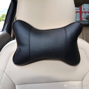 Memory foam car neck pillow attached to headrest for support during long drives